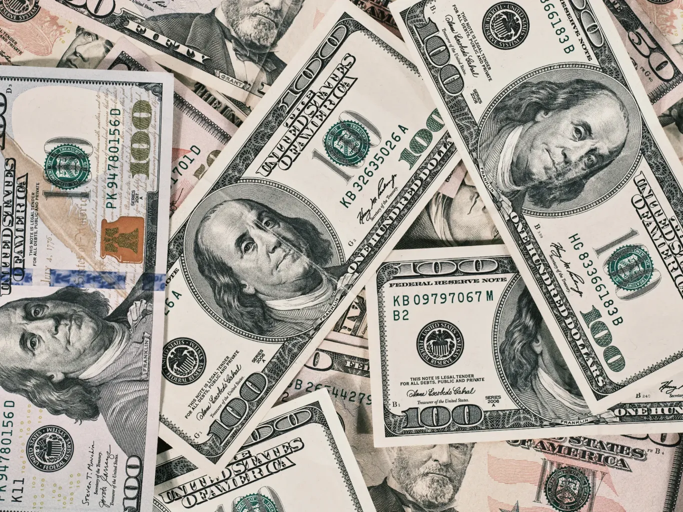 Hundred-dollar bills symbolizing business rewards and financial benefits