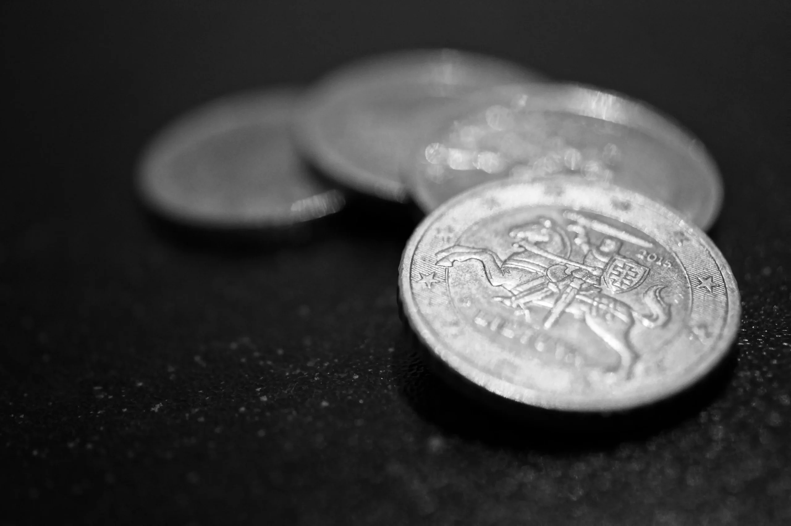 Close-up of silver coins - Symbolizing savings and rewards
