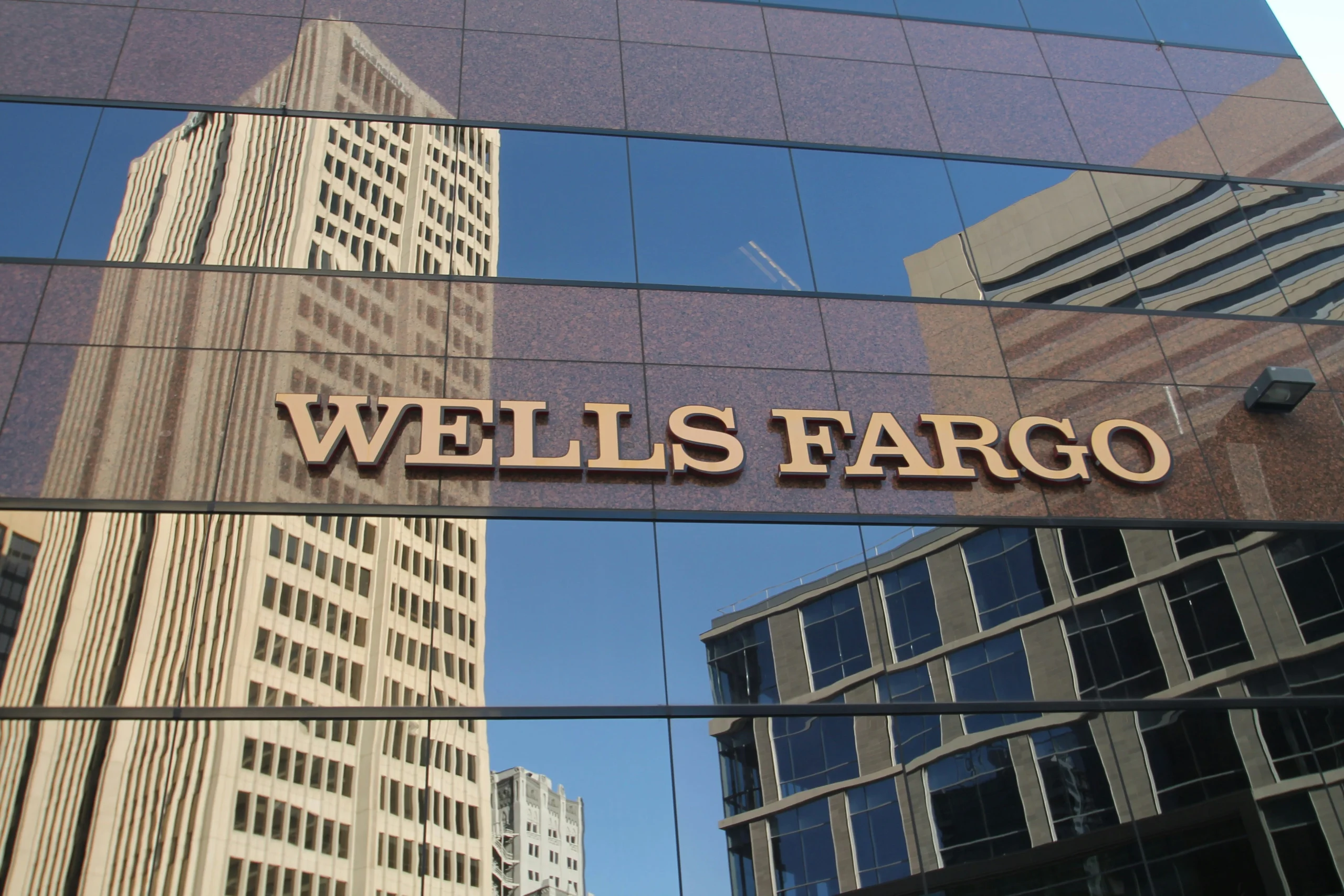 Wells Fargo building with its logo, symbolizing the company's financial services and credit card offerings.